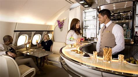 Emirates A380 onboard lounge bar passengers socializing