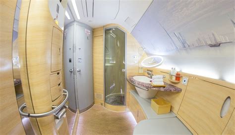 Emirates A380 onboard shower spa luxury aviation interior