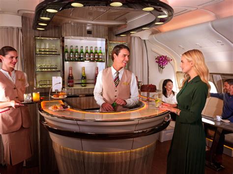 Emirates Airbus A380 onboard bar with bartender and luxury seating area