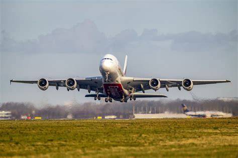 Emirates Airbus A380 taking off from Dubai International Airport for Singapore