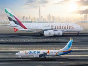 Emirates and flydubai aircraft operating at Dubai International Airport terminal