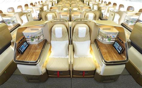 Emirates business class lie-flat seat with mattress topper