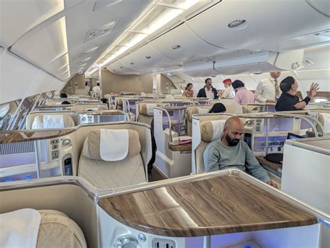 Emirates business class suite with privacy doors luxury cabin lighting