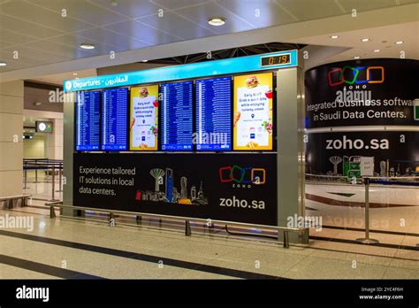 Emirates departure board in Dubai showing multiple US flights