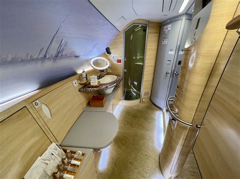 Emirates First Class private suite with shower spa access highlighted