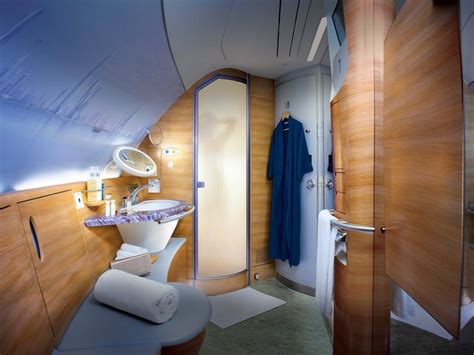 emirates first class private suite with shower spa and minibar on airbus a380