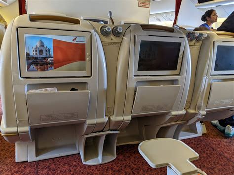 Emirates ICE entertainment system 4K screen inside Boeing 777 business class seat