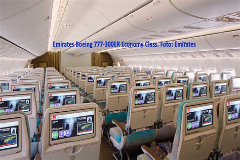 Emirates maintenance team performing cabin overhaul on Boeing 777-300ER