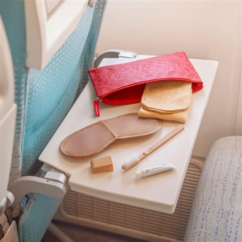Emirates Premium Economy amenity kit blanket pillow