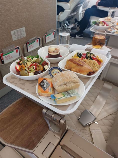 Emirates premium economy meal fine china glassware gourmet inflight dining