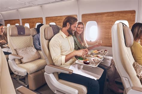 Emirates premium economy meal service with china plates and wine