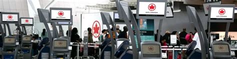empty air canada check-in area inside montreal yul terminal following route cut announcement