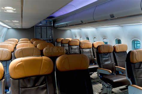 empty airline business class cabin with premium seats reserved for last-minute passengers