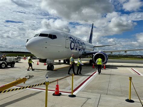 empty airport gate with Avelo Airlines branding during midweek operations