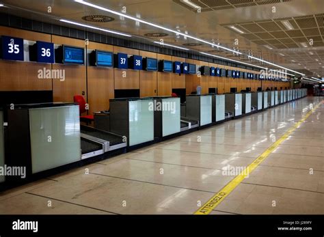 empty check-in counters at Paris Orly Airport amid strike chaos