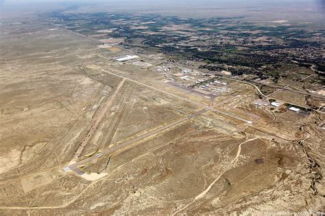 empty runway and control tower at pueblo memorial airport after contract shift