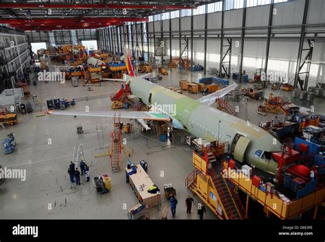 Engineers assembling Airbus A380 at Hamburg-Finkenwerder final production facility