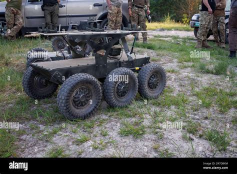 engineers assembling Termit ground drone at Ukrainian defense facility