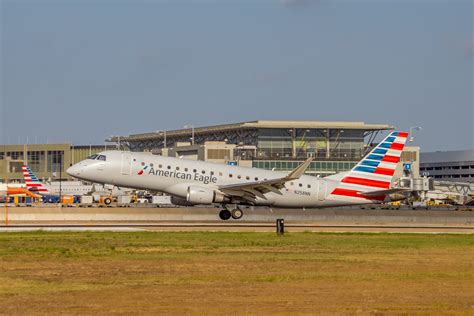 Envoy Air E175 at airport gate