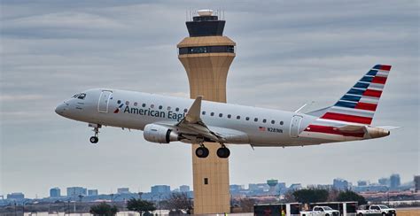 Envoy Air Embraer E175 taking off from DFW under American Eagle branding
