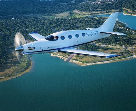 Epic E1000 performing high-speed flight above clouds