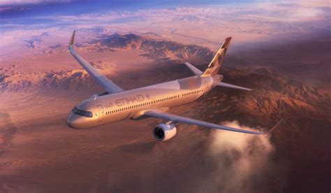 etihad a321lr flying over european cityscape during golden hour