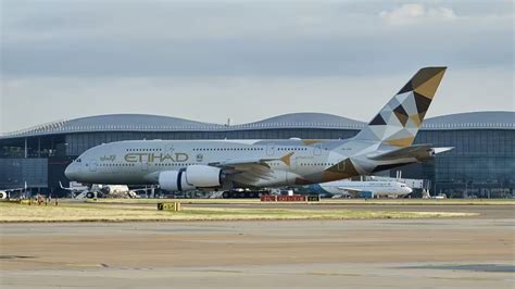 Etihad Airbus A380 lineup at Abu Dhabi during evening departures