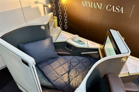 etihad airways business class armani bedding cabin