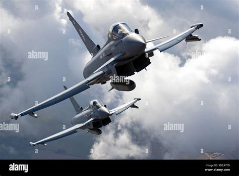 Eurofighter Typhoon executing high-G maneuvers during airshow
