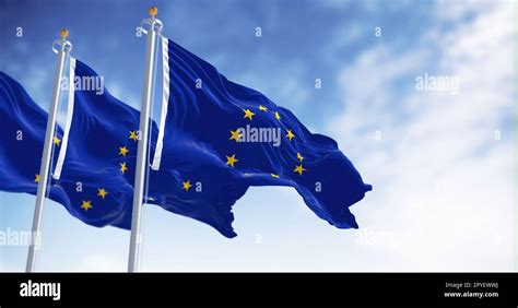 European youth holding EU and Schengen flags during 40th anniversary event