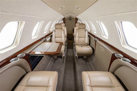 executive passengers boarding a Citation CJ3 at Paris Le Bourget