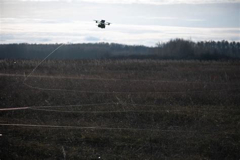 experimental fiber-optic drone swarm undergoing AI field trial in eastern Ukraine