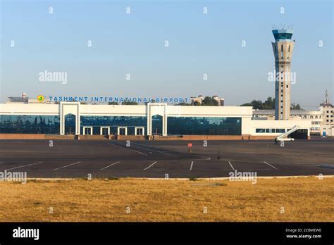 exterior view of Islam Karimov Tashkent International Airport terminal with aircraft parked