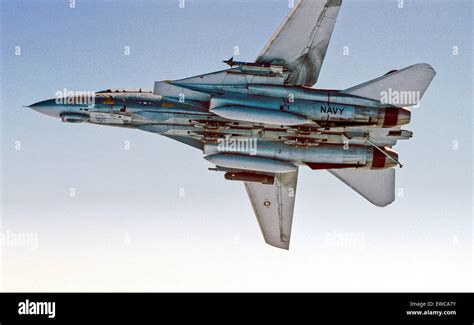F-14 Tomcat variable sweep wings high speed intercept ocean backdrop
