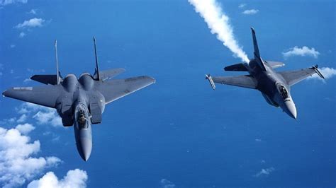 F-15 and F-16 test aircraft flying over Eglin Air Force Base Gulf test range