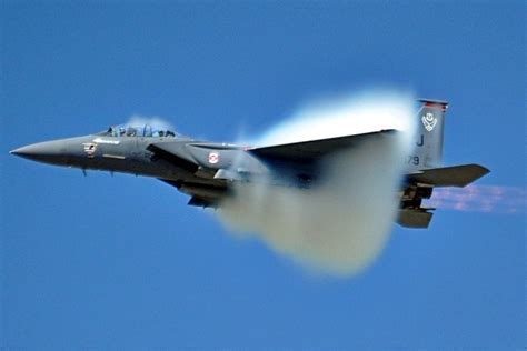 f-15 eagle achieving supersonic speeds at high altitude