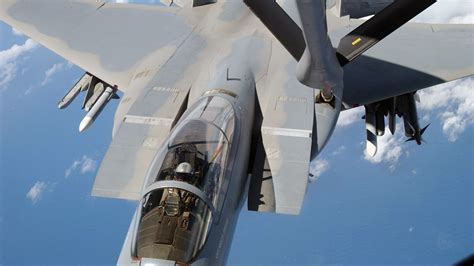 f-15 eagle performing aerial refueling