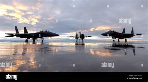 F-15 executing a tight vertical climb, showcasing its exceptional thrust-to-weight ratio
