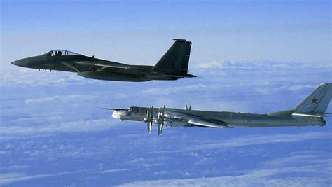 F-15C Eagle intercepting Russian Tu-95 bomber during air policing mission