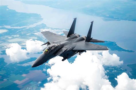 F-15E Strike Eagle refueling mid-air during combat operations