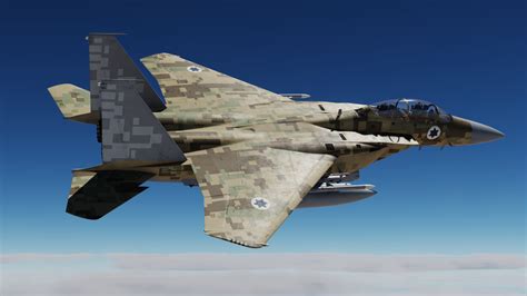 f-15ex eagle ii in flight over desert terrain