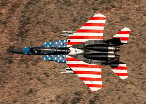 F-15EX flying alongside F-35 stealth fighters in a coordinated combat mission