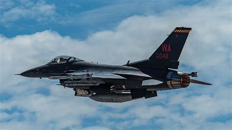 f-16 aggressor with red belly identification stripes