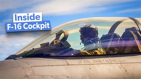 F-16 cockpit with wide bubble canopy and side-mounted control stick