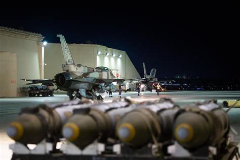F-16 conducting ground attack with cannon fire