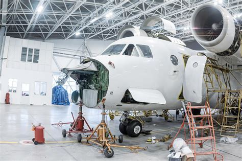f-16 undergoing maintenance upgrade in hangar