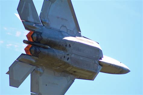 F-22 Raptor ascending at full afterburner during military exercise