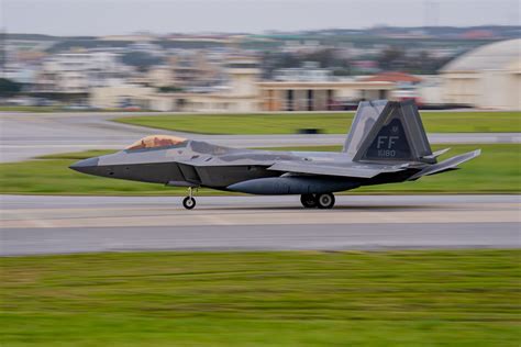F-22 Raptor landing at Kadena Air Base for temporary deployment
