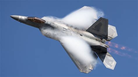 F-22 Raptor performing aerial maneuver