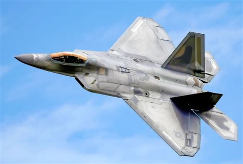 F-22 Raptor undergoing maintenance with stealth coatings exposed
